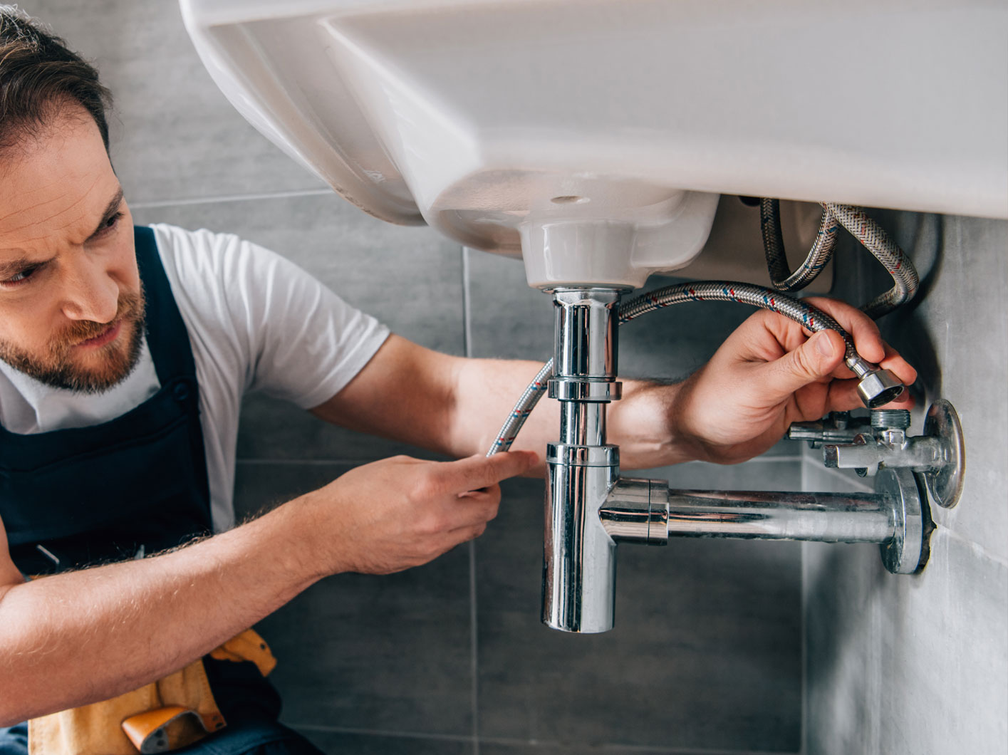Plumber Attaching Water Pipes 2